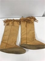 Leather. 16” tall slightly used moccasins