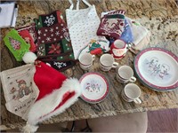 Christmas lot including plates, cups, apron, hat,