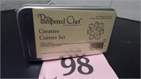 PAMPERED CHEF COOKIE CUTTER SET, NEW IN TIN