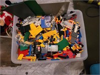 Tote of Legos with some books