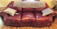 LEATHER SOFA WITH NAIL HEAD DESIGN