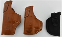 2 Leather Blackhawk Holsters & 1 nylon Uncle Mikes