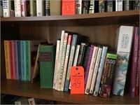 Shelf of cookbooks and craft books