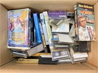 Box of Cassette Tapes and VHS Movies