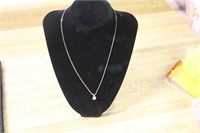 DIAMOND LIKE AND SILVER TONED NECKLACE AND PENDENT