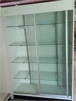 White display case with four glass shelves and