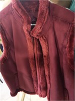 Two fur lined vests size 2xl and unknown size