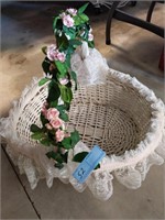 Laced trim large wicker basket w/flowers on