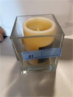 Candle holder with battery operated candle