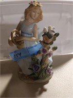 Lady in the flower garden figurine