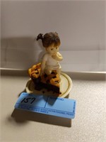Girl with piece of pie figurine