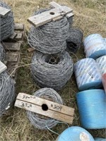 Pile Rolls of Barbed Wire
