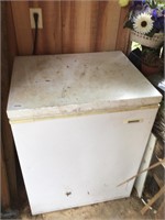 Smaller chest freezer. Dirty but COLD