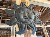 Metal sleeping sun decorative item