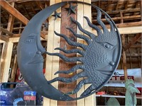 Metal sun and moon ornament