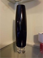 Black vase with bubble on bottom