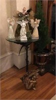 Glass top table with metal base 26” tall