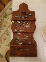 Souvenir spoon holder and spoons