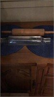 1 wooden rolling pin and 1 glass rolling pin