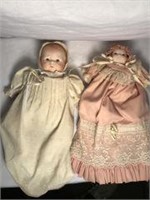Handpainted porcelain Baby dolls w glass eyes