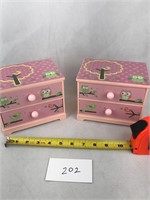Two matching small decorative jewelry boxes
