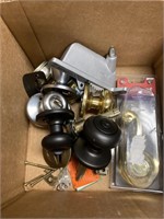 Box with miscellaneous door knobs