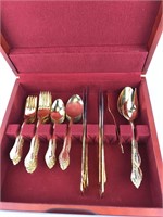 Gold plated cutlery set for eight