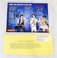 AUTOGRAPHED JONAS BROTHERS PICTURE W/COA