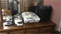 Items on dresser camera shredder, printer