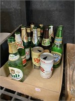 beer bottles and vintage beer cans