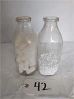(2) unmarked Milk Bottles
