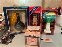 COLLECTION OF AFTERSHAVE BOTTLES IN BOXES