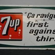 7 UP EMBOSSED "FIRST AGAINST THIRST" TIN SIGN  "IT