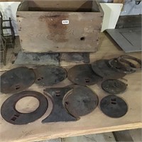 Vintage box, cast iron stove lids covers