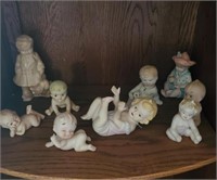 9 Doll Figurines