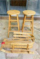 2 WOOD BAR STOOLS AND BABY SLED