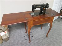 Singer Electric Sewing Machine in Cabinet