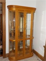 Modern oak lighted curio cabinet 46x12x76 LR