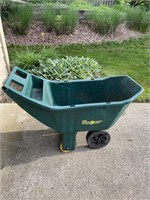 Large green plastic garden cart