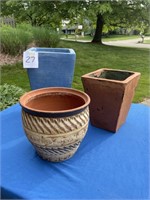 Three ceramic flower pots