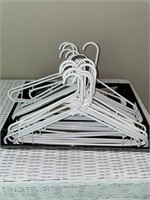 Clothes hangers with tray.