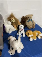 Plastic tote and stuffed animals