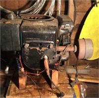 Vertical shaft lawn mower motor on stand