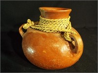 Pottery Piece with Rope