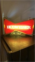 Lit Budweiser sign-works well! Can ceiling mount