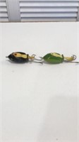 Two vintage popper frog lures