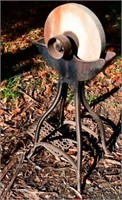 Pedal operated sandstone sharpening wheel