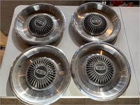 Set of old Lincoln hubcaps