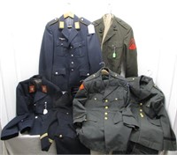 Good assortment of (6) military uniforms.