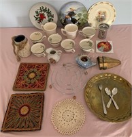 899 - CUPS, PLATES, TRIVETS, MORE